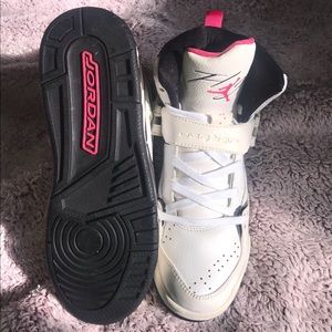 Pink white and black Flight Jordans